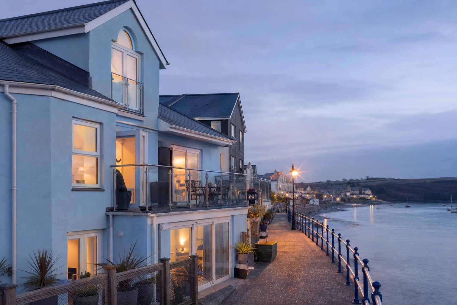 Saundersfoot harbour apartment exterior at dusk